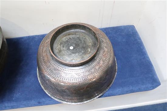 An 18th/19th century Persian tinned copper bowl, 15.25in. and 12.25in.